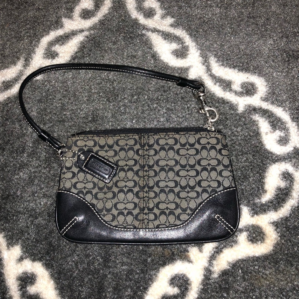 Gray and Black Coach Wristlet